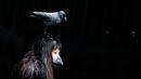 Model membawakan busana dari desainer writtenafterwards selama Autumn/Winter 2016 Tokyo Fashion Week di Jepang, (16/3/2016). Writtenafterwards membawa suasana mistis pada pagelaran busana ini. (REUTERS/Thomas Peter)
