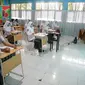 Uji coba pembelajaran tatap muka di SMA 21 Makassar (Liputan6.com/Fauzan)