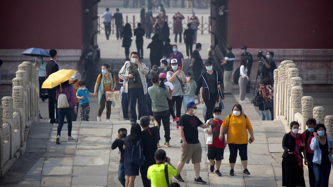 FOTO: Corona Mereda, Kota Terlarang China Kembali Dibuka