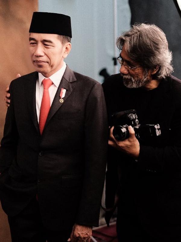Sebentar lagi dilantik sebagai Presiden dan Wakil Presiden RI periode 2019-2024, ini momen dibalik pemotretan resmi Jokowi dan Ma'ruf Amin. (Sumber: Instagram/@darwis_triadi)