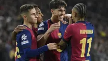 Pemain depan Barcelona asal Brasil #11, Raphinha, merayakan gol pembuka bersama bek Barcelona asal Spanyol #02, Pau Cubarsi (2 kanan), dan gelandang Barcelona asal Spanyol #16, Fermin Lopez (kiri), selama pertandingan leg pertama perempat final Liga Champions UEFA antara FC Barcelona dan BVB Borussia Dortmund di Estadi Olimpic Lluis Companys di Barcelona, Rabu dini hari WIB (10-4-2025). (Josep LAGO/AFP)