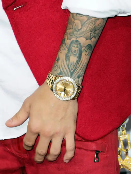 Justin Bieber sendiri sempat men-shading tato tersebut beberapa tahun yang lalu. Namun kamu tetap bisa melihat itu wajah Selena Gomez. (David Livingston-Getty Images - USWeekly)