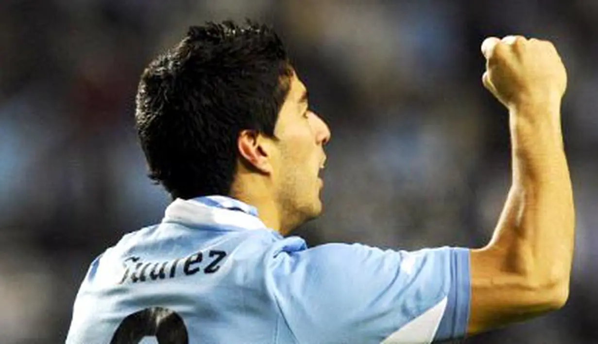 Kegembiraan Luis  Suarez yang memborong dua gol kemenangan Uruguay atas Peru 2-0 pada partai semifinal Copa AMerica di La Plata, Argentina, 19 Juli 2011. AFP PHOTO/DANIEL GARCIA