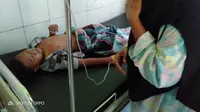 Z (11) salah satu korban luka akibat tersengat listrik jebakan tikus di Kabupaten Demak, Minggu,30/5/2021. (Foto: Liputan6.com/Kusfitria Marstyasih)