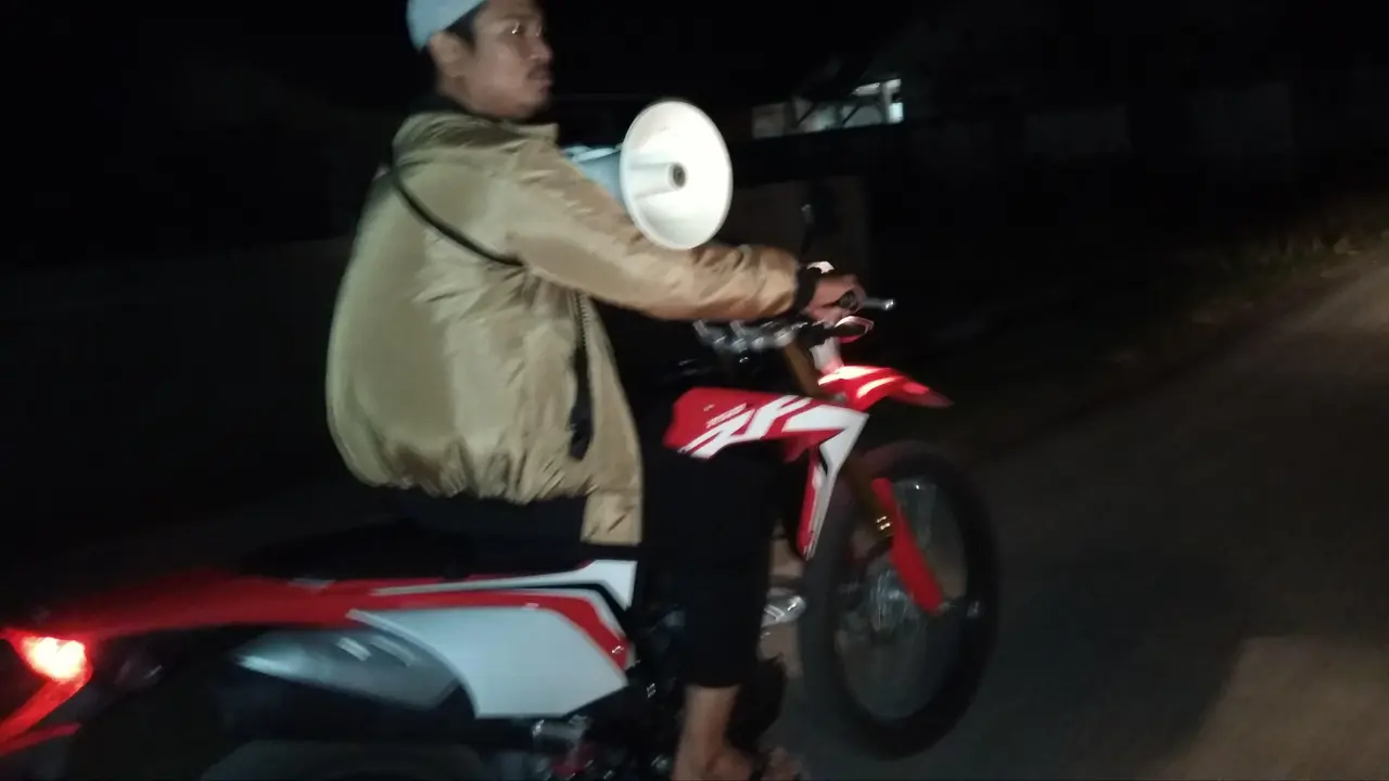 Tradisi Bangunkan Sahur