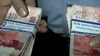 6 Orang tersangka baru 2 hari mengontrak rumah di Mampang, mencetak uang palsu pecahan Rp 100 ribu.