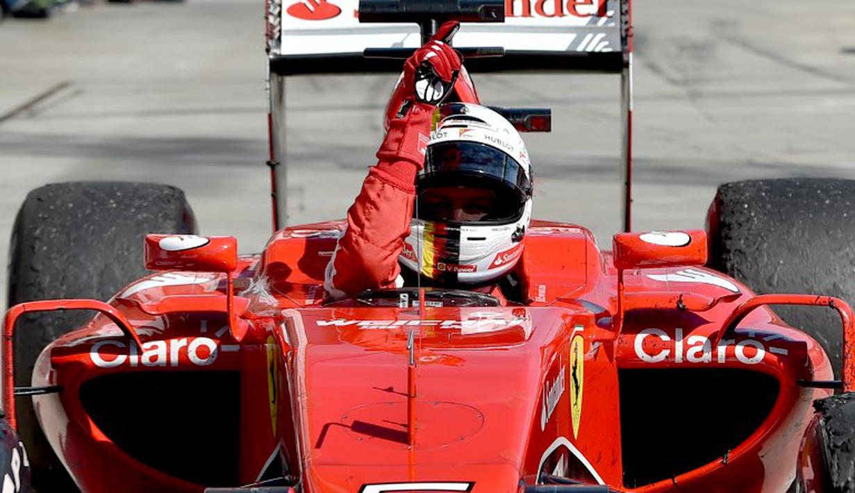 Ekspresi Sebastian Vettel setelah memenangi balapan. (AFP PHOTO/Andrej Isakovic)