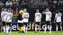 Para pemain Jerman tertunduk usai pertandingan melawan Belanda pada grup C  kualifikasi Euro 2020 di Hamburg, Jerman (6/9/2019). Belanda menang telak 4-2 atas Jerman. (AP Photo/Martin Meissner)