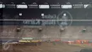 Beberapa truk mengantri untuk mengangkuti material saat renovasi Stadion GBK Jakarta, Selasa (18/10). Pengerjaan renovasi Stadion GBK bagian persiapan jelang Asian Games 2018 dan ditargetkan selesai Oktober 2017. (Liputan6.com/Helmi Fithriansyah)