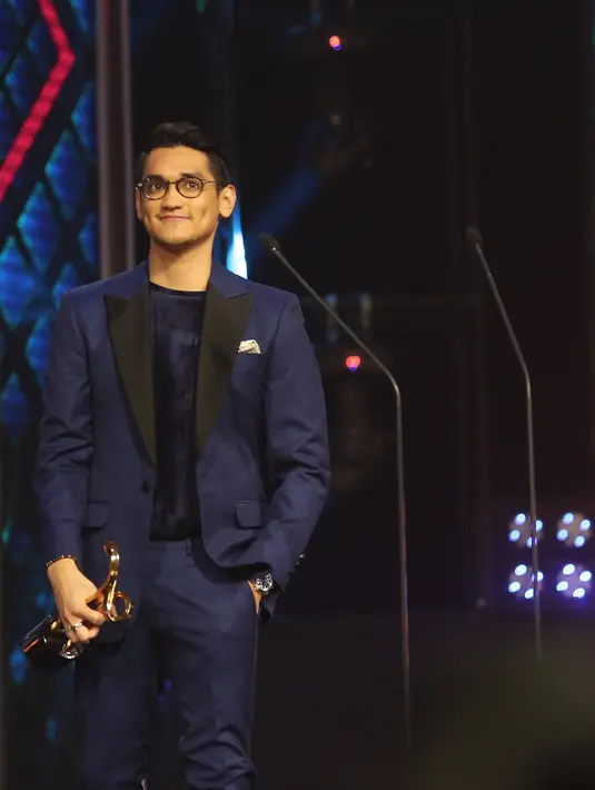 Dalam pidato kemenangannya, Afgan mengucap syukur dan berterima kasih kepada sebuah merek kopi yang membuatnya menang. (Bambang E. Ros/Bintang.com)