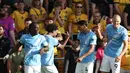 Pemain Manchester City, Tijjani Reijnders melakukan selebrasi bersama Oscar Bobb setelah mencetak gol ke gawang Bournemouth dalam laga Liga Inggris 2025/2026 di Molineux stadium, Wolverhampton, Inggris, Sabtu (16/08/2025) waktu setempat. (AFP/Darren Staples)