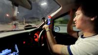 Phiraphon, driver taksi online yang ternyata anggota band FULL dengan 17 juta subscriber. (Bola.com/Bagaskara Lazuardi)