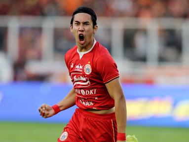 Bek Persija Jakarta, Ryuji Utomo, melakukan selebrasi usai membobol gawang PSM Makassar pada laga Piala Indonesia 2019 di SUGBK, Jakarta, Minggu (21/7). Persija menang 1-0 atas PSM. (Bola.com/M Iqbal Ichsan)