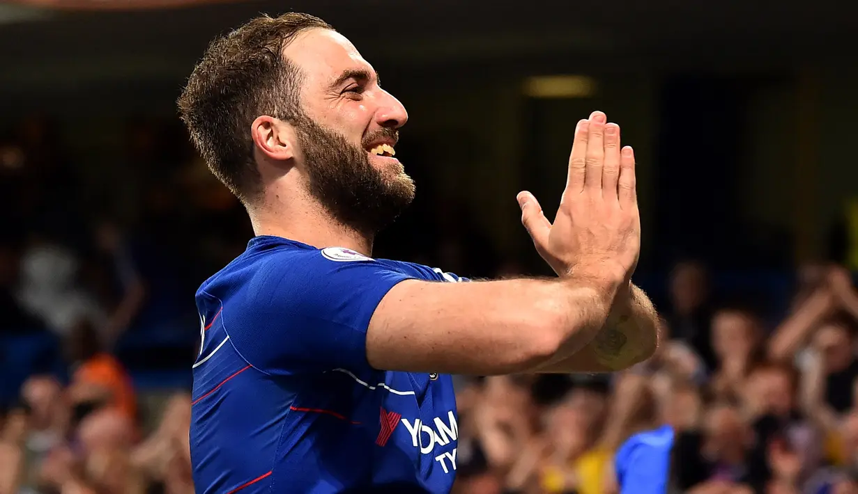 <p>Bomber asal Argentina ini merupakan salah satu pencetak gol andal di Liga Italia. Gonzalo Higuain yang sempat dipinjam Chelsea dari Juventus pada musim 2018/2019 gagal menunjukan performa terbaiknya sehingga The Blues mengembalikannya ke Turin. (AFP/Glyn Kirk)</p>