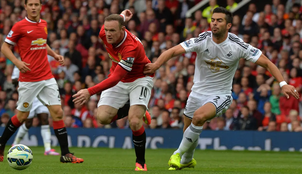 Jordi Amat pernah bermain di Liga Inggris memperkuat Swansea City pada tahun 2013 hingga 2017. Bermain sebagai bek tengah, Jordi Amat sudah pasti tentu menjaga pemain hebat di Liga Inggris saat itu. (AFP/Paul Ellis)