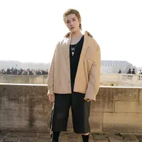 Taeyong NCT tampil bergaya streetwear memadukan leather jacket dengan black tank top dan chelsea boots. @loewe.