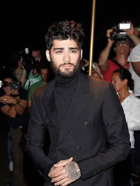 Sulit dilupakan bagi Perrie, mengingat 4 tahun mereka sudah menghabiskan waktu bersama. Memulai kasih di tahun 2012, dilanjutkan dengan bertunangan pada tahun 2013, dan berakhir di Agustus 2015. (AFP/Bintang.com)