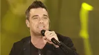 Robbie Williams mengungkapkan pengalaman tak terlupakan saat harus dievakuasi dari kamar hotel (AP Photo)
