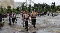 Kepala Polresta Pekanbaru Kombes Jeki Rahmat Mustika usai melepas personel untuk menjaga TPS pada hari pencoblosan beberapa waktu lalu. (Liputan6.com/M Syukur)