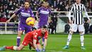 Kemenangan Juventus hadir berkat gol bunuh diri pemain Fiorentina Lorenzo Venuti pada masa injury time babak kedua. (AFP/Alberto Pizzoli)