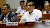 Menteri Hukum dan HAM Yasonna Laoly saat mengikuti rapat kerja dengan Komisi III DPR, di Kompleks Parlemen Senayan, Jakarta, Kamis (13/6). Raker membahas pendahuluan RKA-KL dan Rencana Kerja Pemerintah (RKP) Kementerian Hukum dan HAM tahun 2020. (Liputan6.com/Johan Tallo)