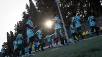 Korea-Korea Selecao pada pertandingan uji coba kedua mereka selama pemusatan latihan di Portugal, Rabu (27/11). Tim KKS berhasil menang besar atas Associaco Deportiva Pasteis da Bola dengan skor 6-1. (Bola.com/Bagaskara Lazuardi)