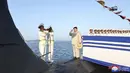 Kapal selam Kim Kun Ok ini dilaporkan mampu mengangkut 10 rudal nuklir saat berlayar. (STR/KCNA VIA KNS/AFP)