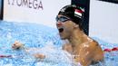  Ekspresi perenang putra Singapura, Joseph Schooling, setelah memenangi 100m gaya kupu-kupu putra Olimpiade Rio 2016 di Olympic Aquatics Stadium, Rio de Janeiro, Brasil, (12/8/2016). (Reuters/Marcos Brindicci)