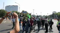Rayakan Harkitnas, mahasiswa berunjuk rasa di depan Istana Merdeka. (Liputan6/Faizal Fanani)