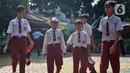 Menurut MK, pendidikan nasional merupakan tanggung jawab utama negara yang dijamin dalam Undang-Undang Dasar Negara Republik Indonesia Tahun 1945. Negara memiliki kewajiban untuk menyelenggarakan pendidikan, membiayainya, dan memastikan pemerataan kesempatan pendidikan bagi semua warga negara. (Liputan6.com/Angga Yuniar)