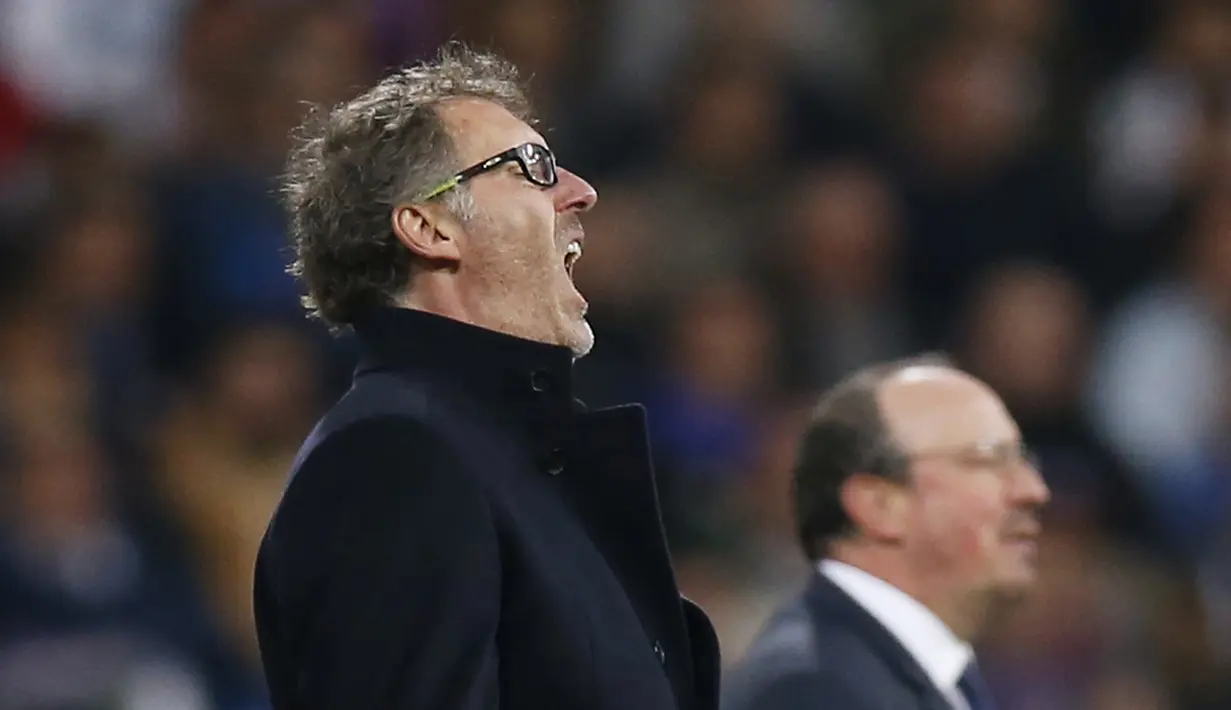 Ekspresi pelatih PSG Laurent Blanc dan pelatih Real Madrid Rafael Benitez pada lanjutan Liga Champions Grup A di Stadion Santiago Bernabeu, Madrid, Rabu(4/11/2015) dini hari. Madrid menang tipis 1-0.  (Reuters / Sergio Perez)