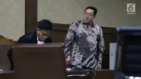 Terpidana korupsi pengadaan alat simulator SIM di Korlantas Polri, Budi Susanto (kanan) saat sidang pengajuan Peninjauan Kembali di Pengadilan Tipikor, Jakarta, Rabu (5/9). Sebelumnya, Budi divonis delapan tahun penjara. (Liputan6.com/Helmi Fithriansyah)