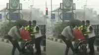 Seorang wanita pengendara motor mendadak berhenti di perempatan lampu lalu lintas di Tugu PON Kota Dumai. Diduga terpapar kabut asap yang pekat. (Liputan6.com/ Istimewa)