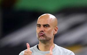 Pelatih Manchester City Josep Guardiola (AP/Martin Rickett)