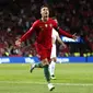 Penyerang Portugal, Cristiano Ronaldo, melakukan selebrasi usai mencetak gol ke gawang Swiss pada laga UEFA Nations League di Estadio Do Dragao pada Kamis (6/6) dini hari WIB. Portugal menang 3-1 atas Swiss. (AP/Armando Franca)