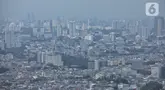 Suasana gedung bertingkat yang diselimuti kabut di Jakarta, Kamis (15/5/2025). (Liputan6.com/Angga Yuniar)
