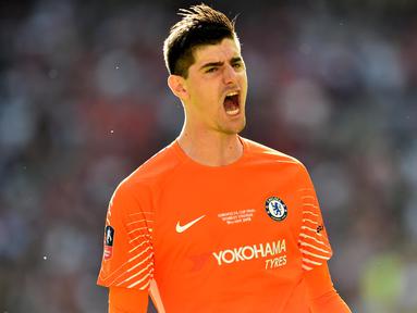 Real Madrid melalui situs resminya pada Rabu (8/8/2018), mengumumkan telah mencapai kesepakatan dengan Chelsea terkait transfer Thibaut Courtois. (AFP/Glyn Kirk)