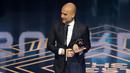 Pelatih Manchester City, Pep Guardiola memberikan sambutan setelah memenangkan penghargaan pelatih terbaik FIFA 2023 ada acara Best FIFA Football Awards yang berlangsung di Eventim Apollo, Hammersmith, London, Senin (15/01/2024) waktu setempat. (AP Photo/Kirsty Wigglesworth)