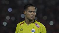 Kiper Persija Jakarta, Andritany Ardhiyasa, usai tampil melawan Arema FC pada laga Liga 1 di SUGBK, Jakarta, Sabtu (31/3/2018). Persija menang 3-1 atas Arema FC. (Bola.com/Vitalis Yogi Trisna)