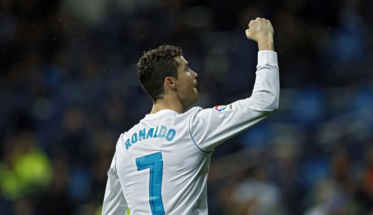 Ekspresi Cristiano Ronaldo saat merayakan golnya ke gawang Getafe pada lanjutan La Liga Santander di Santiago Bernabeu stadium, Madrid, (3/3/2018). Real madrid menang 3-1. (AP/Francisco Seco)