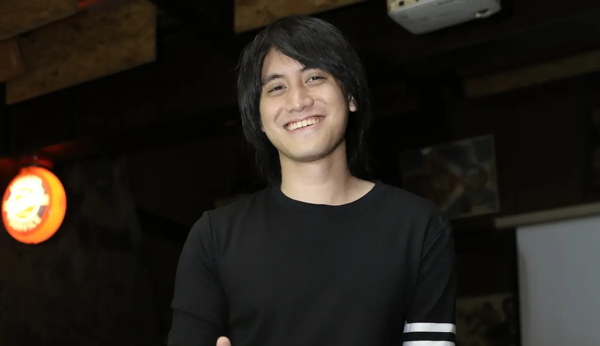 Sejauh ini Kevin memang selalu terlihat tampil dengan gaya busana yang simple dan sederhana. Warna-warna yang digunakannya juga tak pernah yang mencolok mata. (Galih W. Satria/Bintang.com)