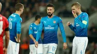Reaksi para pemain Arsenal setelah kebobolan dari FC Koln pada laga Liga Europa di RheinEnergieStadion, Koln, Kamis (23/11/2017). (AFP/Ina Fassbender)