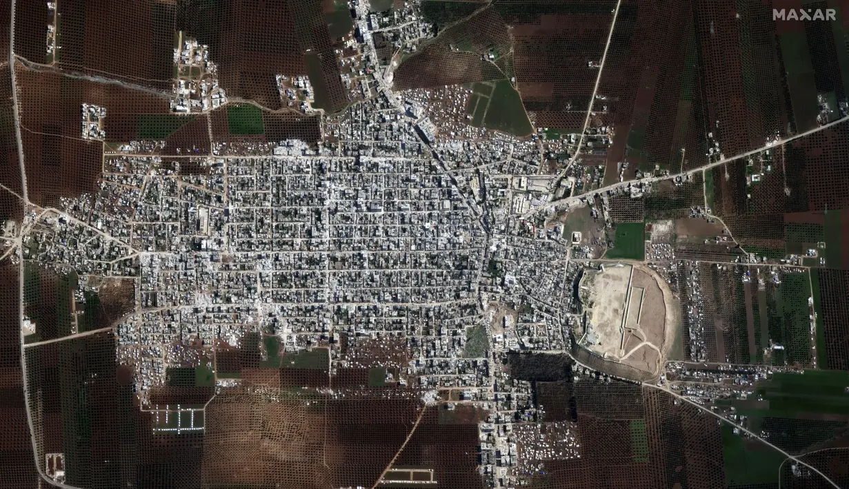 Gambar Citra satelit menunjukkan gambaran kerusakan bangunan kota dan daerah sekitarnya di Jindires, Suriah, pada Sabtu, 11 Februari 2023, setelah gempa bumi. Terjadi kerusakan signifikan pada infrastruktur kritis di seluruh wilayah setelah bencana gempa bumi melanda 6 Februari 2023. (Satellite image ©2023 Maxar Technologies via AP)