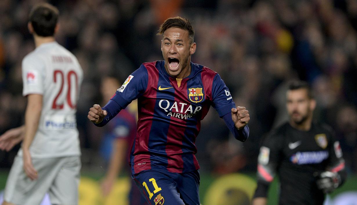 Striker Barcelona, Neymar, merayakan gol yang dicetaknya ke gawang Atletico Madrid pada laga La Liga Spanyol di Stadion Camp Nou, Barcelona, Minggu (11/1/2015). (AFP/Josep Lago)