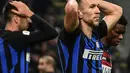 Ekspresi gelandang Inter Milan, Ivan Perisic usai timnya dikalahkan Bologna pada lanjutan Serie A yang berlangsung di stadion Giuseppe Meazza, Milan, Minggu (3/2). Inter Milan kalah 0-1. (AFP/Miguel Medina)