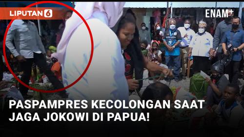 VIDEO: Paspampres Panik, Jokowi Dikalungkan Pedagang Papua