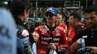 Pecco Bagnaia usai finis ketiga pada Sprint Race MotoGP Malaysia 2023 hari Sabtu (11/11/2023). (MOHD RASFAN / AFP)