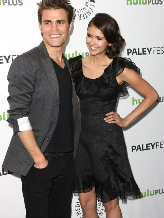 Dari keterangan foto yang dibuat sepertinya Nina dan Paul bertemu secara tidak di sengaja. (FREDERICK M. BROWN / GETTY IMAGES NORTH AMERICA / AFP)