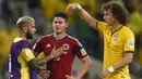 James Rodriguez. Gelandang serang Timnas Kolombia berusia 31 tahun yang baru saja bergabung dengan Olympiacos pada 15 September 2022 ini menjadi bintang dalam putaran final Piala Dunia 2014 yang berlangsung di Brasil. Kolombia memang mentok di perempatfinal usai kalah dari tuan rumah Brasil dengan skor 1-2. Namun James Rodriguez berhasil tampil tajam dengan menjadi top skor Piala Dunia 2014 dengan torehan 6 gol. (AFP/Fabrice Coffrini)