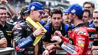 Penentuan juara dunia MotoGP musim 2022 ternyata harus ditentukan hingga seri terakhir yang menjadi seri ke-20 di MotoGP Valencia 2022. Namun bukan musim ini saja hal tersebut terjadi. Tercatat musim ini menjadi musim kelima gelaran MotoGP harus ditetukan hingga seri terakhir untuk memastikan siapa pembalap yang berhak meraih gelar juara dunia. Berikut daftar lengkapnya. (AFP/Mohd Rasfan)